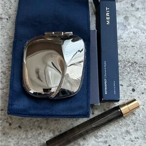 Merit Silver silver compact and Retrospect (travel size) fragrance